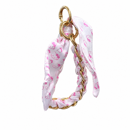 CASE STRAP COQUETE HELLO KITTY MGS IPH 13/14/15