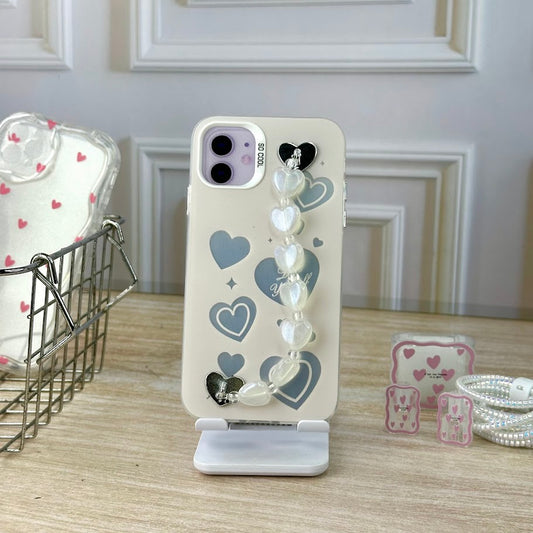 Cora y llavero beige IPH 11