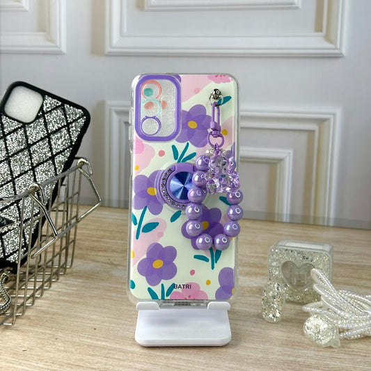 Flores lila y llavero SM A04S